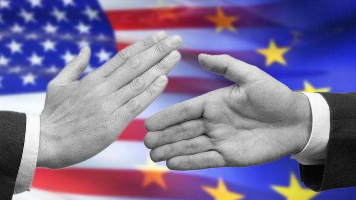 Handschlag zwischen Europa und den USA.