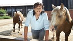 Annette Börger mit zwei Pferden