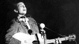 Bob Dylan bei einem Konzert 1963
