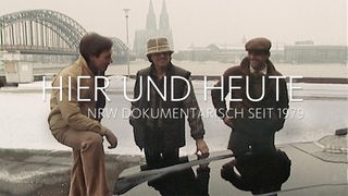 Drei Menschen vor dem Kölner Dom