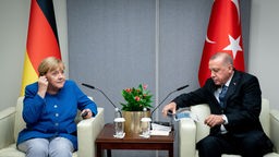 New York: Bundeskanzlerin Angela Merkel (CDU) trifft Recep Tayyip Erdogan, Staatspräsident der Türkei, am Rande des UN-Klimagipfels bei den Vereinten Nationen