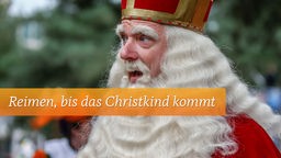 Schriftzug "Reimen, bis das Christkind kommt" und Weihnachtsmann mit stattlichem Bart