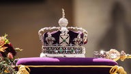 The coffin of Queen Elizabeth II with the Imperial State Crown resting on top.