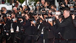 Fotografen bei der Premiere des Kinofilms Killers of the Flower Moon auf dem Festival de Cannes 2023 / 76.