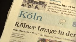Die Titelseite einer Tageszeitung mit der Schlagzeile Image der Stadt Köln