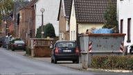 Straße in Manheim mit Containern