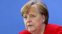 Berlin: Bundeskanzlerin Angela Merkel (CDU) gibt Pressekonferenz im Anschluss an eine Beratung mit den Ministerpräsidenten der Bundesländer zur Lockerung der Beschränkungen, die in Kraft gesetzt wurden, um die Ausbreitung des Coronavirus zu verlangsamen.