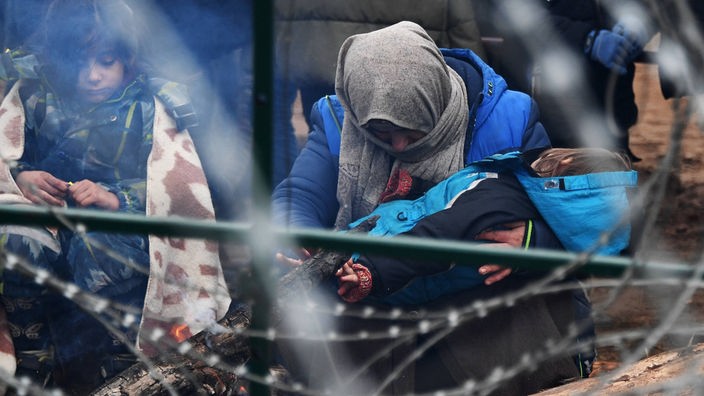 Geflüchtete in einem Flüchtlingslager nahe der belarussisch-polnischen Grenze