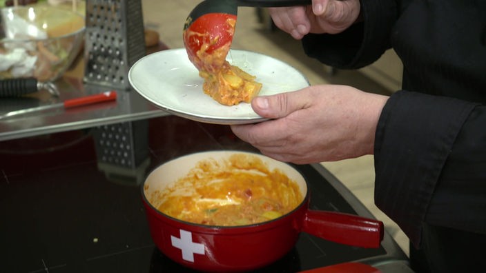 Das Bild zeigt das fertige Gericht "Walliser Tomaten-Käse-Fondue".