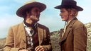 Mit Hilfe des Revolverhelden El Charro (William Bogart, li.) will Bill Grayson (Peter Lee Lawrence) die Ermordung seines Vaters rächen