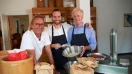 Frank Buchholz mit Felix Krämer und dessen Vater. 