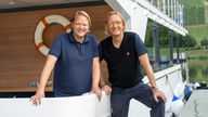 Björn Freitag und Frank Buchholz auf dem Boot. 