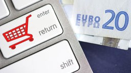 Symbolbild Online Bestellung / Tastatur mit 20 Euro Note
