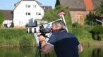 Kameramann filmt die Weser