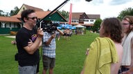 Rockpalast-Reporter Ingo Schmoll für's Summer Breeze 2017 bei einem Interview im Freibad Dinkelsbühl