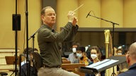 Dirigent Frank Strobel und die Musiker des WDR-Funkhausorchesters