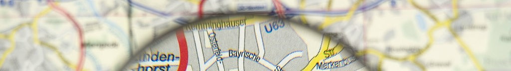 Lupe über Landkarte, die Stadt Dortmund ist groß gekennzeichnet