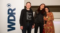 Die drei Preisträger des WDR Jazzpreis 2023: Ulrich Hackfort, Leiter der Big Band des Inda-Gymnasiums in Aachen, Saxofonistin Angelika Niescier und Sängerin Maryam Akhondy.