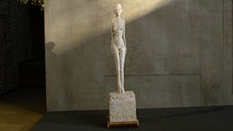 Alberto Giacometti: "Frau auf dem Wagen"