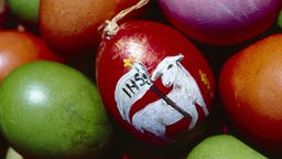 Osterlamm auf Ei gemalt