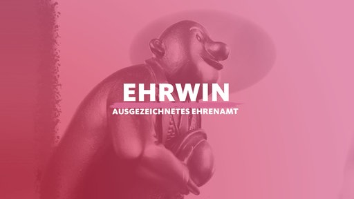 Die goldene Ehrwin-Statue, davor der Titel "Ehrwin - ausgezeichnetes Ehrenamt"