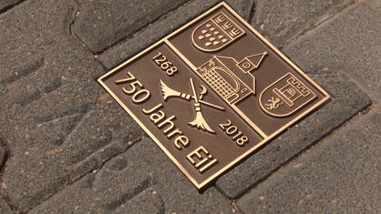 Bronzeplatte mit Eil-Logo