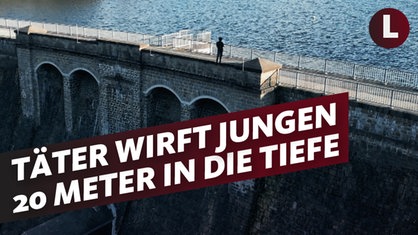 Eine Staumauer, der Text lautet: Täter wirft Jungen 20 Meter in die Tiefe