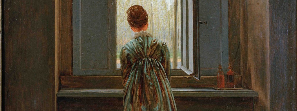 Das Gemälde "Frau am Fenster" von Caspar David (1822) zeigt eine Frau in Rückenansicht die aus einem Fenster schaut.