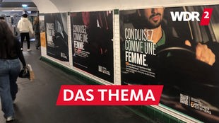Kampagne für mehr Verkehrssicherheit in Frankreich: In einer Metrounterführung hängen Plakate mit der Aufschrift "Conduisez comme une femme" ("Fahre wie eine Frau")