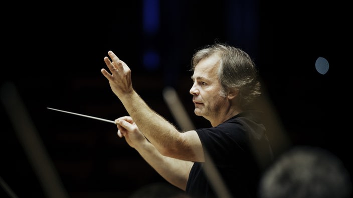 Der Dirigent Axel Kober.