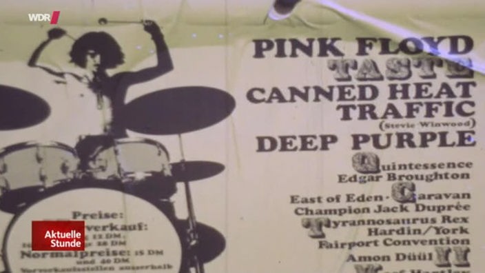 Plakat mit den Bands beim Woodstock in Aachen