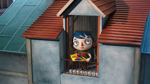 Zucchini muss nach dem plötzlichen Tod seiner Mutter in ein Waisenhaus. Er schaut aus einem Fenster in den Himmel.