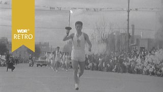 Der olympische Fackellauf in Japan 1964