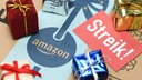 Streik Schild und Geschenke auf Amazon Paket 