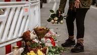 Brand in Solingen und Blumen für Opfer 