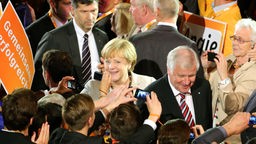 Bundeskanzlerin Angela Merkel und CSU-Chef Horst Seehofer beim CDU-Wahlkampfendspurt in Düsseldorf
