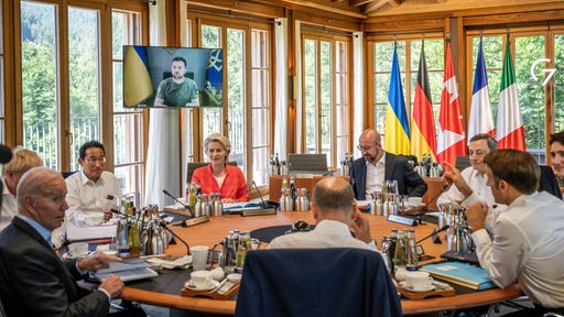 Die G7-Gipfelteilnehmer tagen, während der ukrainische Präsident Selenskyj per Videokonferenz zugeschaltet ist.