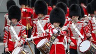 Troops march the streets in Westminster on the day of Britain's King Charles' coronation in London