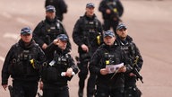 Armed Metropolitan Police officers on patrol ahead of the Coronation of King Charles III and Queen Camilla