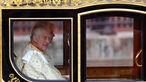 Britain's King Charles and Queen Camilla sit in Diamond Jubilee State Coach at Buckingham Palace on the day of coronation ceremony