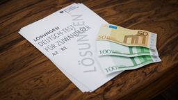 Lösungen zu einem Deutsch-Test für Zuwanderer und 250€ Bargeld