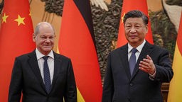 Bundeskanzler Olaf Scholz und der chinesische Präsident Xi Jinping.
