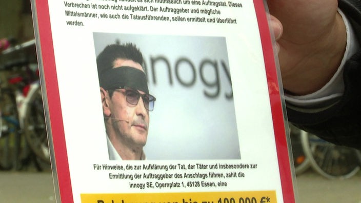 Der frühere Innogy-Manager Bernhard Günther ist auf einem Plakat abgebildet.