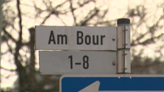 Ein Straßenschild von "Am Bour"