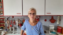 Ein Frau in ihrer Küche