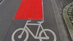 Fahrrad-Piktogramm auf Radweg