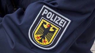 Ärmel einer Bundespolizeiuniform mit Logo