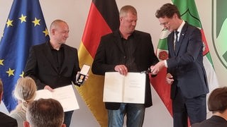Florian Leeser, Benedikt Skirlo, Ministerpräsident Wüst