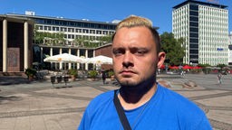 Domick S., Mülheim, erhebt Vorwürfe zu Polizeigewalt auf CSD, auf dem Kennedyplatz in Essen