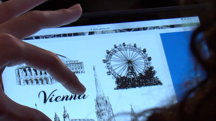 iPad mit Symbolen und einem Vienna-Schriftzug